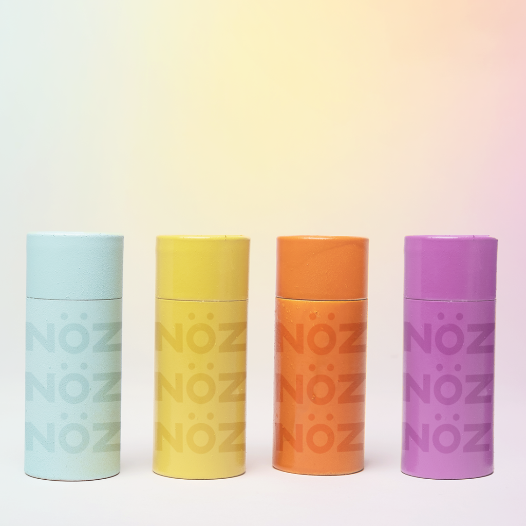 Four color variations of reef safe, eco friendly, and colorful vegan Nöz sunscreen: front view